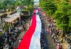 Ribuan Warga Meriahkan Kirab Bendera Merah Putih 500 Meter di Festival Merah Putih Bogor Ribuan Warga Meriahkan Kirab Bendera Merah Putih 500 Meter di Festival Merah Putih Bogor